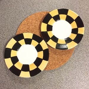2 small saucers black and yellow checkered pattern